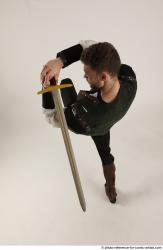 KEETA MOVING POSE WITH SWORD